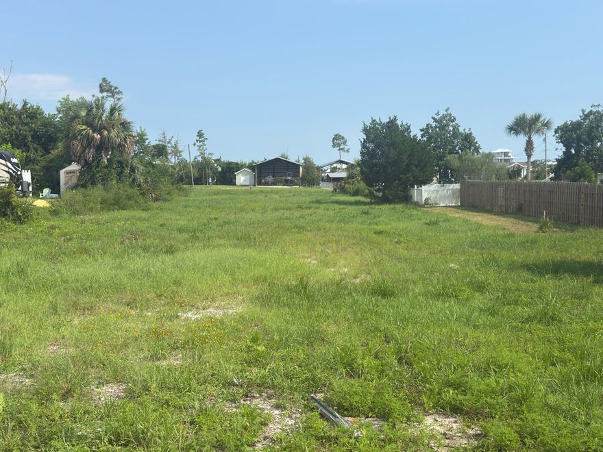 St Joe Beach 2nd block vacant lot that is cleared and only 800' from Highway 98. This 75' by 150' parcel is just over 1/4 acre so one has plenty of room for a nice beach cottage and storage for all of the beach toys. Save thousands of dollars on tree and debris removal as the X FLOOD ZONE lot will be suitable for ground floor living quarters so no annoying elevated foundation or stairs! This unique beach lot can be your jumping of point to all things beachy and Gulf County. Water, Sewer, Power, Phone/ Internet are available and adjacent to the property. Some dimensions were obtained from the Gulf County Property Appraiser's Office, please verify if important.