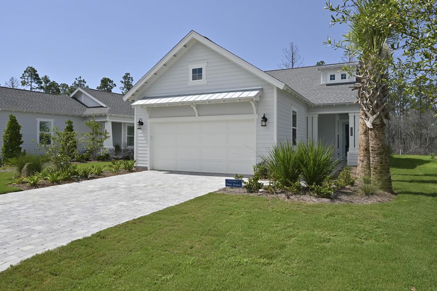 This like new, fully furnished home in Naturewalk at Watersound Origins is move-in ready! The single-story 2-bed, 2-bath floor plan boasts a convenient den and an oversized 2-car garage. Interior features include laminate flooring throughout with tile in the laundry and baths, granite countertops, and more. The gas fireplace in the open concept living area is a natural gathering place, and the spacious covered back porch lends itself to al fresco dining & entertaining. The primary bedroom boasts two walk-in closets plus a luxurious ensuite bath with dual vanities and a tiled walk-in shower. Residents enjoy access to world-class amenities, including a resort style community pool, fitness center, world-renowned par-3 golf course, sports courts, nature trails, and dock access at Lake Powell
