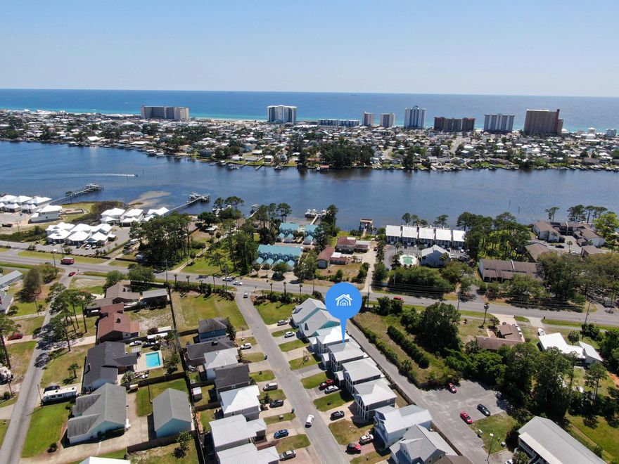 AMAZING VALUE ON THE BEACH!! How about a quick 4-minute ride to the beach? This 4-bedroom, 3 FULL bath home has been updated in 2023 and ready for its new owner. One bedroom is downstairs with an adjoining full bathroom. Upstairs the large master bedroom has private access to the walk out balcony. Check out the master bathroom with a separate tub, tile shower & HUGE walk-in closet. There is an additional closet in the master bedroom as well. 2 other well sized bedrooms and full bath make this the perfect layout. New covered deck off the back of the home and a fully fenced in yard. Full Irrigation System Included.