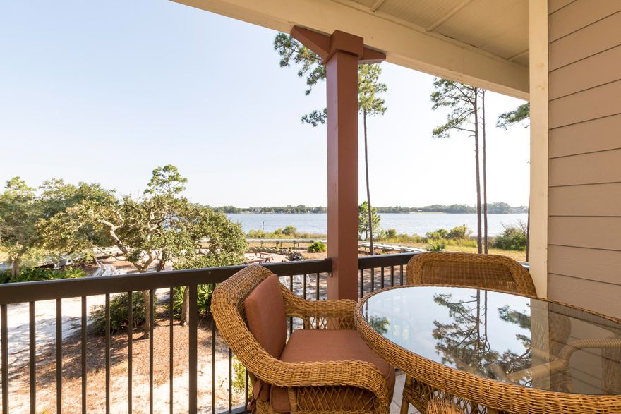 Step into one of the most sought after locations in Wild Heron. Walk through an arched column entrance living area and experience water-view at its best.. Unit is 2/ bd/rms and 2/baths.Travertine floors throughout, granite countertops, Wild Heron is nestled in a 750 acre coastal sanctuary with Lake Powell, rare coastal dune lake. Outside your door is a State of the Art fitness center, pool, community park, and playground. Other amenities include library/owner's lounge and boathouse including access to free kayaks to explore Lake Powell., golf, tennis center, covered gazebo with fireplace, and a lakeside fire pit. Very convenient location, Located 5 minutes from Pier Park and 5 minutes from 30A and Rosemary Beach. It's time to make Wild Heron your home. Every day is an adventure.