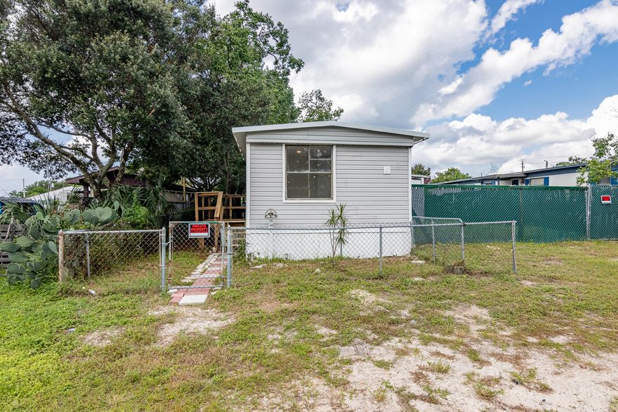 Nice opportunity in the Beachy Community of Laguna Beach! This mobile home sits on a nice size lot(50x120)only a few blocks from the beach! This mobile home has a nice size living /kitchen area. It also has a split bedroom floor plan. With your finishing touches this would make a sweet Beach getaway. We just love Laguna Beach! The beachy lifestyle is enchanting. This area has its own Grocery store with a gift shop and wine cellar and a local donut and ice cream hangout. Both of these local hangouts are right across the street from the beach. What a cool area! This location is brilliant! it is only minutes from Pier Park, Carillon Beach and the 30A corridor. Come see!