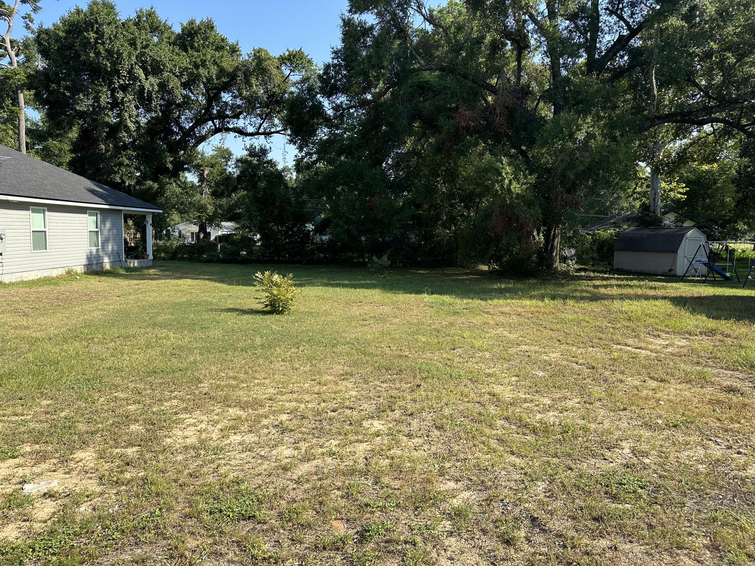 Cleared, vacant lot. Build a home next door to two other new construction homes. Seller has two lots on W Walnut and willing to package.