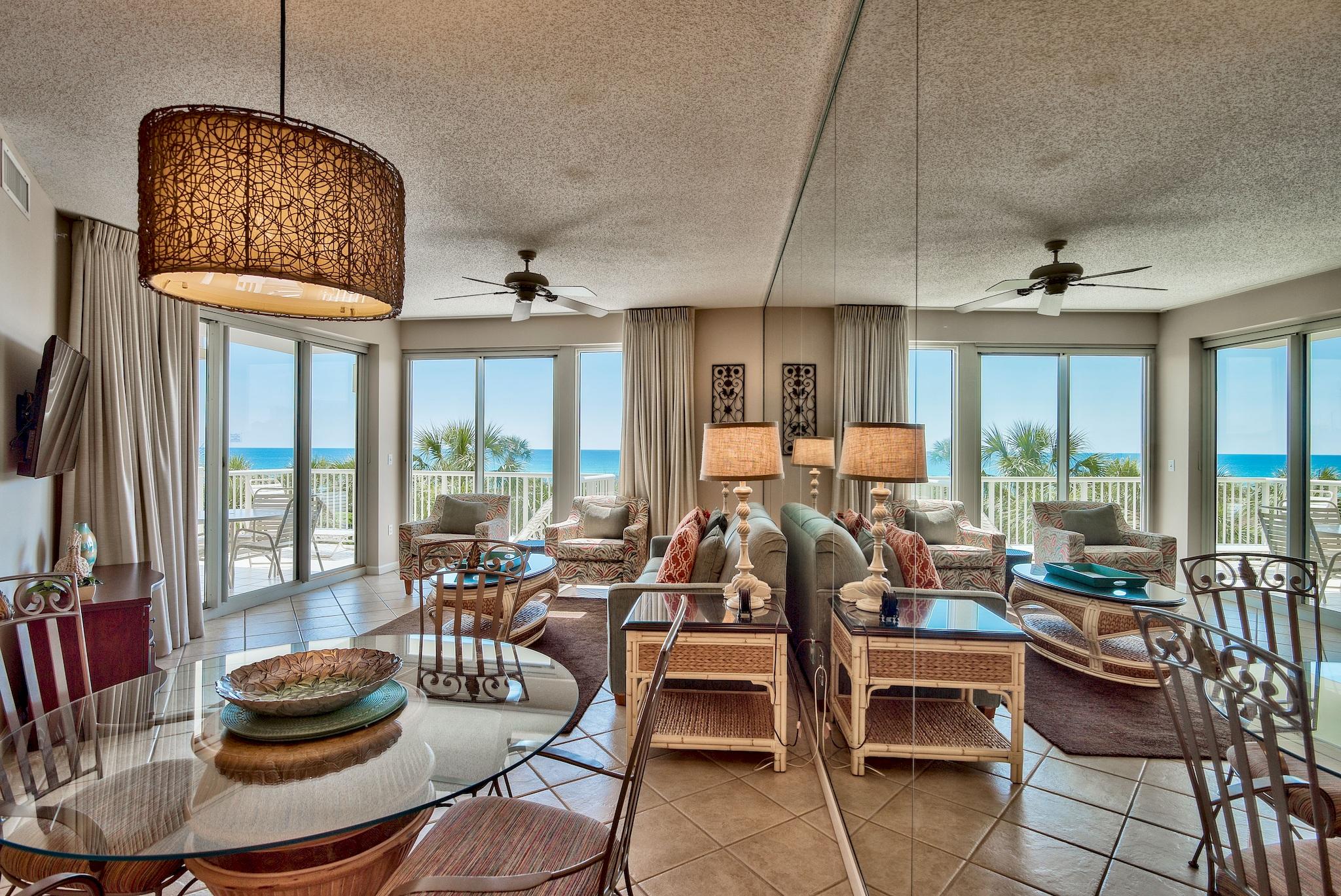 Phenomenal opportunity to own a Gulf front 2-bedroom unit at The Crescent! Prime views of the Gulf of Mexico from this 2nd floor unit. Tile extends through the entry, kitchen, living & dining area and bathrooms. Enjoy views of the Gulf front nearly every room and access the private balcony from the living area and master bedroom. The kitchen is nice & open with brand new Whirlpool stainless steel appliances and there is a large granite breakfast bar, great for casual dining. Plenty of storage with the ample cabinets and pantry. The dining area has updated lighting and the living area is very welcoming with stunning views and a cozy atmosphere. Enjoy coastal living and relax or dine outside on private balcony overlooking the pool and Gulf. Lush tropical landscaping surrounds the pool.