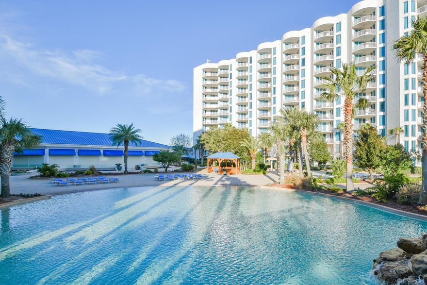 This 4th floor, Easterly facing, two-bedroom condo offers views overlooking the City of Destin & the Gulf of Mexico. It has an open concept living and dining area, as well as an expansive and inviting balcony just perfect for taking in the Emerald Coast sunsets. Enjoy the many onsite amenities, including a lushly landscaped pool area boasting Destin's largest lagoon pool with waterfall features, a kiddie pool, hot tub, and splash pad, as well as a playground, fitness center, and tennis and basketball courts. Also, an on-site restaurant offering lunch, dinner, room service and even in-season poolside service has been recently added. Want your toes in the sand? The resort offers complimentary shuttle service to the beach for you to enjoy Destin's world famous sugar-white sand and