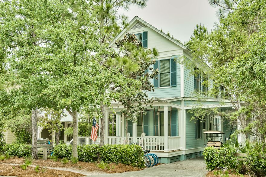 This beautiful Beach Home in Watercolor, welcomes you with its large covered front porch. You will find Knotty Pine Solid Wood Flooring throughout this 3 bed/3 bath home. 1st floor Kitchen & Family Room are open and inviting, great for family gatherings. A Bright & Open Kitchen to enjoy dinners in. You will find a generous sized bedroom w/ en suite on the 1st floor, with the Master Bedroom and additional guest bedroom on the 2nd level. A wonderful Bunk Room w/6 bunks is terrific for the children. The oversized Back Porch, along with the expansive Screened Porch overlooking a Mature Woods, & Lake Access to sit, linger, & enjoy morning coffee or the beautiful evening sunsets. Deeded Beach Access and numerous Community Amenities; Fitness,Tennis, Multiple Pools, Biking/Walking Trails