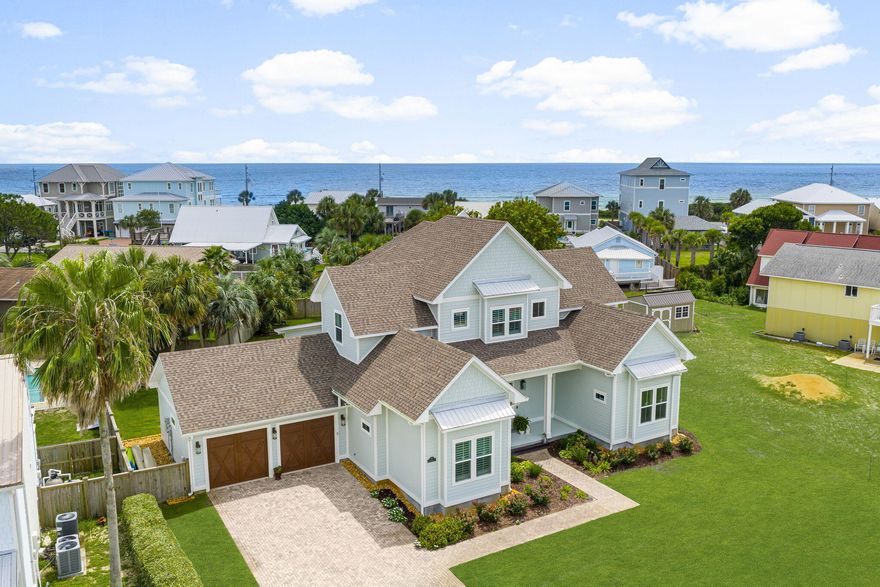 * Luxury Coastal Retreat Home for Sale in Panama City Beach, FL. Experience the ultimate beach lifestyle in this stunning custom-built home on Panama City Beach's quiet and desirable West End. Completed in 2021 by acclaimed builder Rick Koehnemann of Koehnemann Construction, this 4-bedroom, 4 1/2 bathroom home combines timeless craftsmanship with modern amenities, offering both luxury living and exceptional rental potential. This home was designed for Comfort, Relaxation & Entertaining! Just a few houses from the beach on an oversized lot, the property provides abundant outdoor space with room to design your own swimming pool. A fully fenced backyard with privacy fencing and beautiful, mature landscaping creates a sense of comfort and seclusion. A back gate leads to a short walk over the dunes to the undeveloped natural beachwhere sand, sea oats, and the beautiful Emerald waters of the Gulf, makes it feel like your own private stretch of coastline. This home offers an Open-concept main level with sliding glass doors that flow onto a covered screened patio for seamless indoor/outdoor living. The Primary suite is on the main level, plus an additional bedroom provides flexibility and convenience. The indoor elevator adds access to all levels. Second floor features its own living space with a family room, open office area, two guest bedrooms, and a bunk roomperfect for large gatherings, multi-family vacations, or rental flexibility. Bedrooms and the family room access the expansive covered balcony with seasonal Gulf views and refreshing sea breezes. The upstairs bunk room with twin beds gives more flexibility for guests which is perfect for hosting large families or groups. Premium Features & Upgrades are, " Double crown molding throughout main living areas and the Primary bedroom, Single crown molding in guest bedrooms, 9 Inch baseboards throughout, 8 ft tall solid wood doors throughout the home, and 4 Inch Plantation Shutters throughout. " Soaring 12-foot ceilings on the lower level and 10-foot ceilings upstairs. Surround sound system in Living room. Garage Attic space completely covered in 1'' plywood for added storage. " Tankless hot water heater for efficiency and convenience. Trex deck with railing for ease in maintenance " The house is wired for a whole-house generator and a future swimming pool installation. Tons of Storage! " Gulf Vista is a non-HOA Neighborhood with underground utilities, preserving both reliability and beauty. " The Outdoor shower is ideal for rinsing off after beach days. This home is a short drive to 30A, Rosemary Beach, premier restaurants and shopping. Pier Park is a destination with a variety of restaurants, shopping, an IMAX theater, and exciting new attractions including Dolly Parton's Pirates Voyage Dinner Show and Topgolf. This thoughtfully designed Luxury Custom built home offers the best of both worlds: a serene coastal retreat for your family and a high-demand short-term rental opportunity in one of Florida's most coveted beach destinations, Panama City Beach, FL .