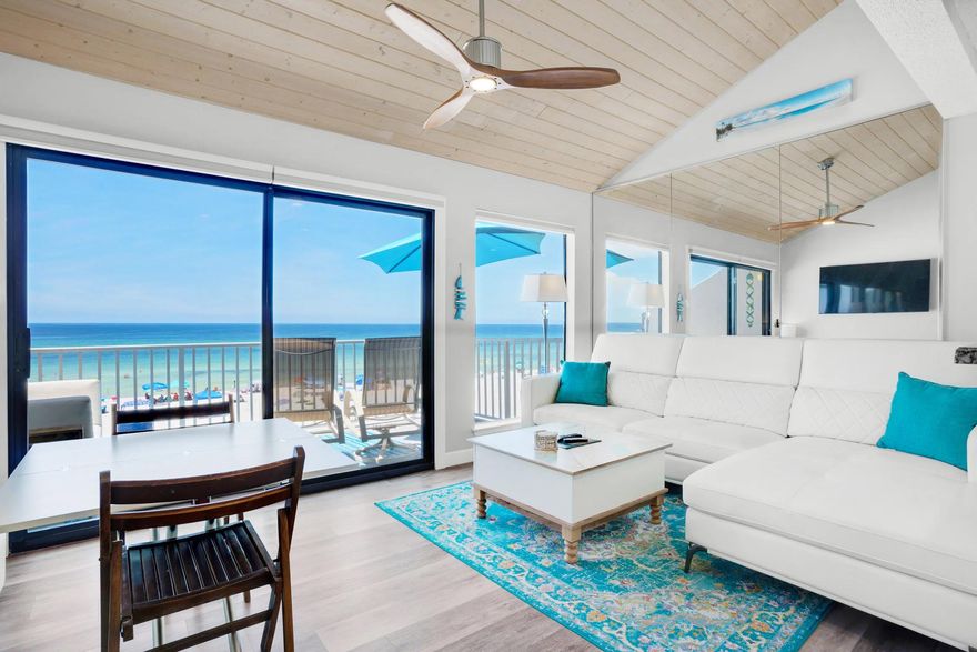 Rare, spectacular corner unit 2br/2ba Beach Front Condo w/indescribable sunsets!  Totally upgraded including luxury plank flooring, vaulted wood plank ceilings in the living area, stainless appliances, granite countertops, new stackable washer/dryer, new heat pump, new  water heater, all new windows and sliding glass doors. The unit comes fully furnished with beautiful stylish furnishings as shown in the photos. Even the building roof was replaced in 2021. Already on the rental market, the unit is a great income producer. Five minutes from many of the great restaurants, entertainment spots, and St. Andrews State park, combined with a private beach access and those sunsets. This unit offers everything vacation goers are looking for. The pool is even heated in the winter!