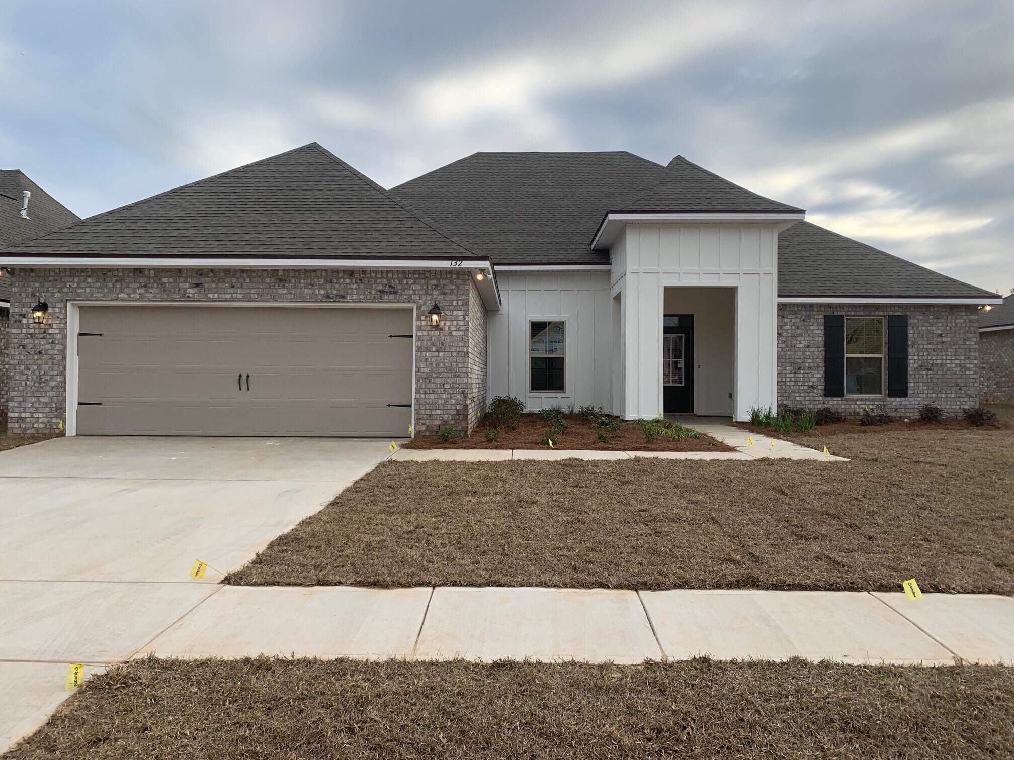 The ARTHUR IV G in The Trails at Hammock Bay community offers a 4 BR, 3 BA, open and split design with a formal dining room, separate breakfast area, and a pocket office. Upgrades added (list attached).Special Features: double vanity, garden tub, separate custom tiled shower, and walk-in closet in master bath, master closet goes through to laundry, double vanity in 2nd bath, en suite bath in BR 4, kitchen island, walk-in pantry, boot bench and drop zone in mud room, covered rear patio, recessed lights, undermount sinks, ceiling fans, bronze plumbing fixtures, framed mirrors, smoke and carbon monoxide, landscaping, architectural 30-year shingles, and more!Energy Efficient Features: tankless gas water heater, kitchen appliance package with a gas range, low E MI windows, and more!