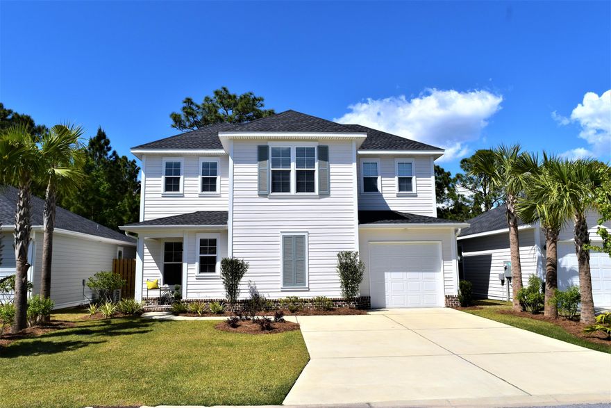 Gorgeous home in CSV just at a year old. Located on a Premium Exterior Lot backing up to green space. Christopher Plus Plan by Huff Development, LLC. Large screened in rear porch, kitchen island with extra storage underneath bar, quartz counter tops, stainless steel appliances and soft close cabinetry finish off this exquisite kitchen. CORE-TEC wood flooring on 1st Floor & porcelain tile baths. HOA community pool, dog park, a new playground & ALL lawn maintenance included in HOA fee.Located just minutes from Gulf Place on 30A and Topsail Hill State Park