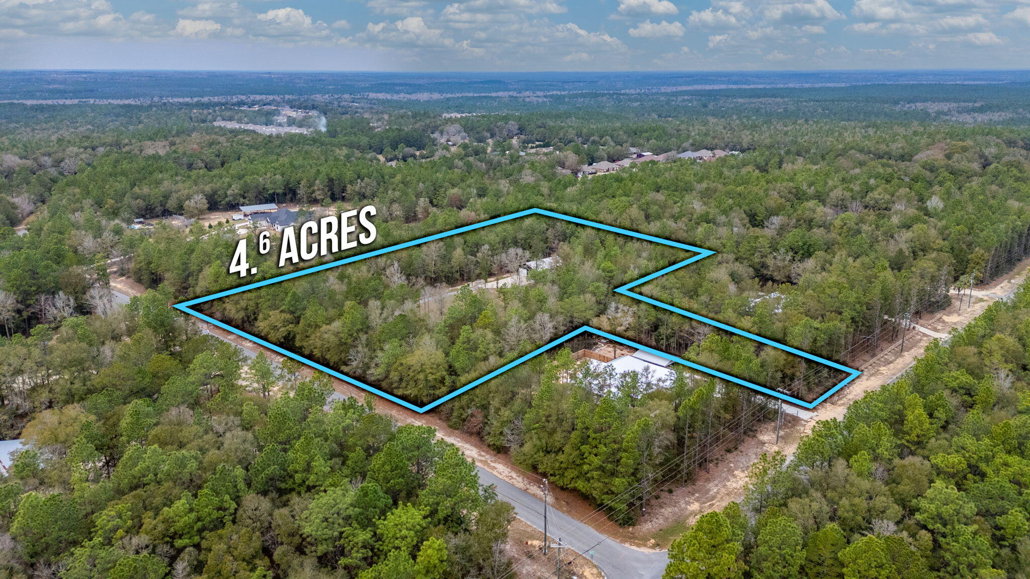4.64 acres with a second homesite clear and ready. Escape to the country charm of Northwest Crestview with this unique property offering endless possibilities! This listing features a beautiful 3-bedroom, 1-bathroom barndominium, perfect as a guest house or a cozy retreat. Imagine welcoming friends and family to their own private space, or enjoying the quiet tranquility yourself.Beyond the barndominium, this property presents a fantastic opportunity to build your dream home. The main homesite is prepped and ready with underground power already in place - all you need is your vision and house plans! Design the custom home you've always dreamed of, perfectly situated on this beautiful piece of land.Enjoy the laid-back lifestyle of Northwest Crestview, while still being convenient located by all the action. With easy access to Hwy 85, Hwy 90, and Interstate 10, you can effortlessly reach the stunning beaches of the Emerald Coast, premier shopping destinations, and exciting entertainment venues. Crestview itself offers a wide array of amenities, including diverse dining options, convenient shopping, and local entertainment, ensuring you're never far from everything you need. Don't miss this chance to create your ideal country escape with the perfect blend of peaceful living and convenient access to everything Northwest Florida has to offer!
Zoning is Rural Residential
