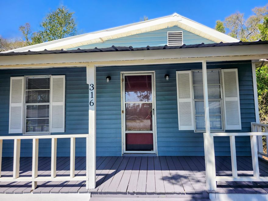 Charming home in DeFuniak Springs city limits, your perfect retreat! This .43 acre property offers quite a bit of privacy for it's central location. It is fully fenced and the healthy tree line surrounding the property offers awesome coverage! This small but fierce home is packed with practicality and flair! This gem is absolutely move in ready and waiting for someone to enjoy its new vinyl flooring and brand-new appliances! The covered porch is perfect for a hot cup of coffee and a couple of rocking chairs. Just starting out and looking for low expense living? Downsizing? Looking for a central hub for visiting our nearby beaches? This home is ready to be yours!