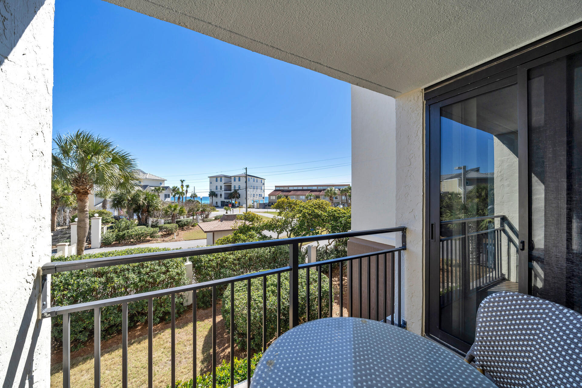 Welcome to the Enclave! This updated beach condo is located directly across the street from the beach! The newly remodeled unit features amazing gulf views from the private balcony. The kitchen boasts custom built maple cabinets, beautiful backsplash and gorgeous granite countertops. New HVAC unit!!! The owner has added a washer/dryer into the unit for easy care for your family, friends and vacationing guests. Enjoy everything you have always wanted in a beach community - a community pool , volleyball, tennis, pickle ball courts, BBQ + so much more! You're just a few steps away from the deeded beach access directly across the street.