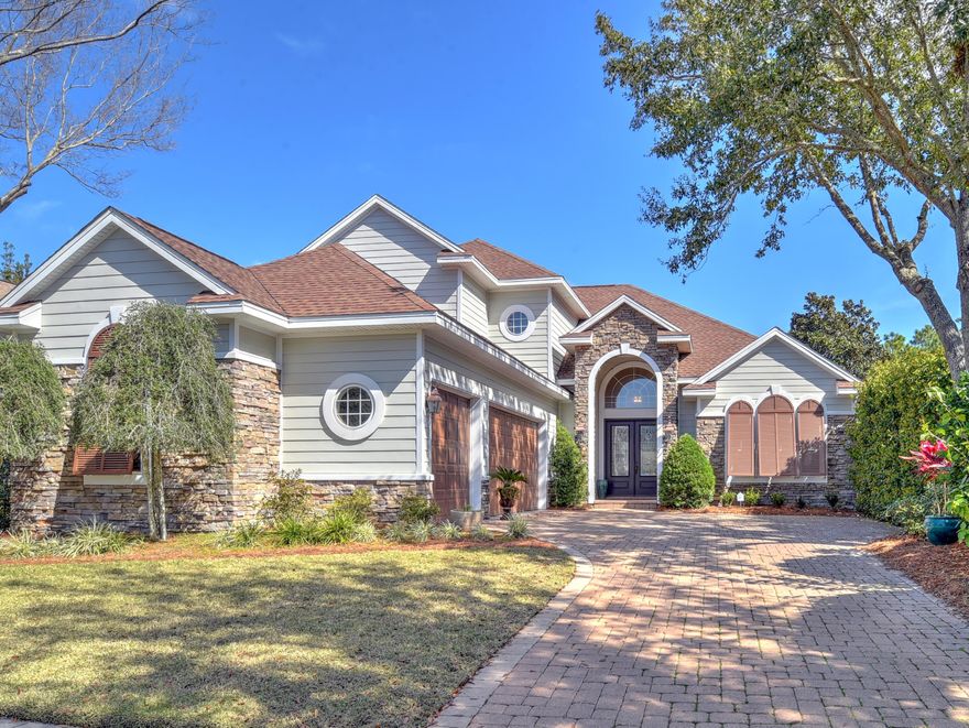 Beautiful five bedroom, four bath home in the desirable golf course community of Kelly Plantation, just steps to the Golf Club, Owner's Club and Fitness Center.  Fabulous open concept floor plan features great room with built-ins and gas fireplace, dining area, large kitchen with breakfast bar, center island, plenty of custom cabinetry, granite counters, stainless Kitchenaid appliances including 5-burner gas cooktop, breakfast area.  Master suite on the main, with two large walk-in closets, bath with walk-in shower, jetted tub, private water closet.  Also on the first level is an ensuite guest bedroom and an additional bedroom (currently used as a study/den), a full bath, laundry room, heated and cooled under the stairs storage area.  On the second level are two bedrooms, each with a walk-