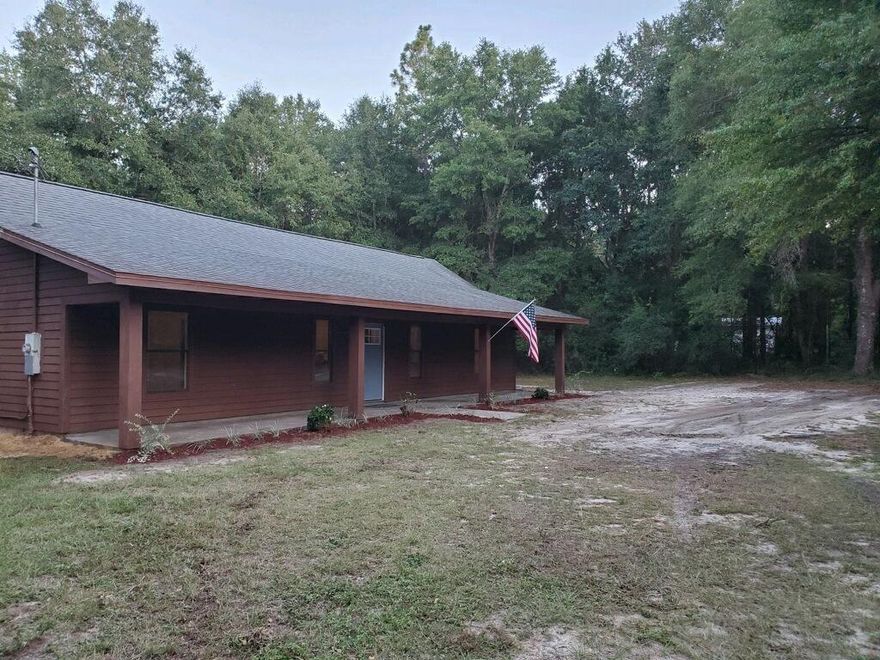 Totally renovated 3-bedroom, 2 bath home on one acre. The home features pine wall and ceilings in the living and kitchen area with high vaulted ceiling and wood beams. There is an open feel between the kitchen and the living area and a modern take on the kitchen with gray shaker cabinets. This home has had a total make over, new kitchen & appliances, all new baths, hot water heater, heating and cooling units, flooring, paint throughout, lights fixtures, plugs and switches and much more. The master bedroom has white ship lap walls with a double trey ceiling. The exterior has a lazy front porch and cypress exterior. You are only minutes form Crestview and all points south. There are 2 concrete slabs for a shop/storage building both slabs have water.