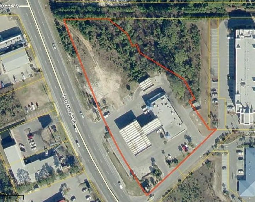 The subject site is located on the northeast corner of Thomas Drive (alsoknown as CR 3031) and Daniel Street, approximately one-third of a milesouth of the signalized intersection of Thomas Drive and Magnolia Beach Road, in Panama City.The land is attached to the parcel of land that the Shell Gas Station/C-Store sits on. Only the .91 acres of vacant land is available with approximately 275' of frontage along Thomas Dr.