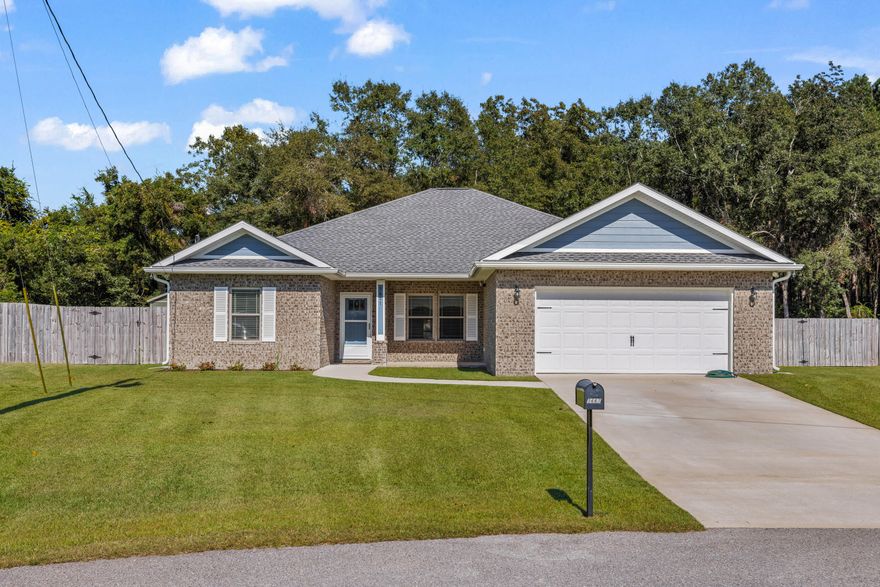 CLOSING COST CONCESSION WITH ACCEPTABLE OFFER! This .55 acre pie-shaped lot at the back of the subdivision was hand picked by the owners to have their custom dream home built. 2162 sq/ft of living space +484 sq/ft garage-heated & cooled by a Pioneer 18,000 BTU MINI-SPLIT & fully insulated= 2646 sq/ft. Upgrades GALORE - See photos for full list. Fully fenced back yard with double gates on both sides makes room to park an RV or Boat. The back gate leads to additional deeded property going back 30 ft. The 10x12 yard building conveys. A 30x14 ft patio was added off the screened in porch.  The producing Pecan trees offer shade & the Rainbird lawn irrigation system keeps the new sod green.