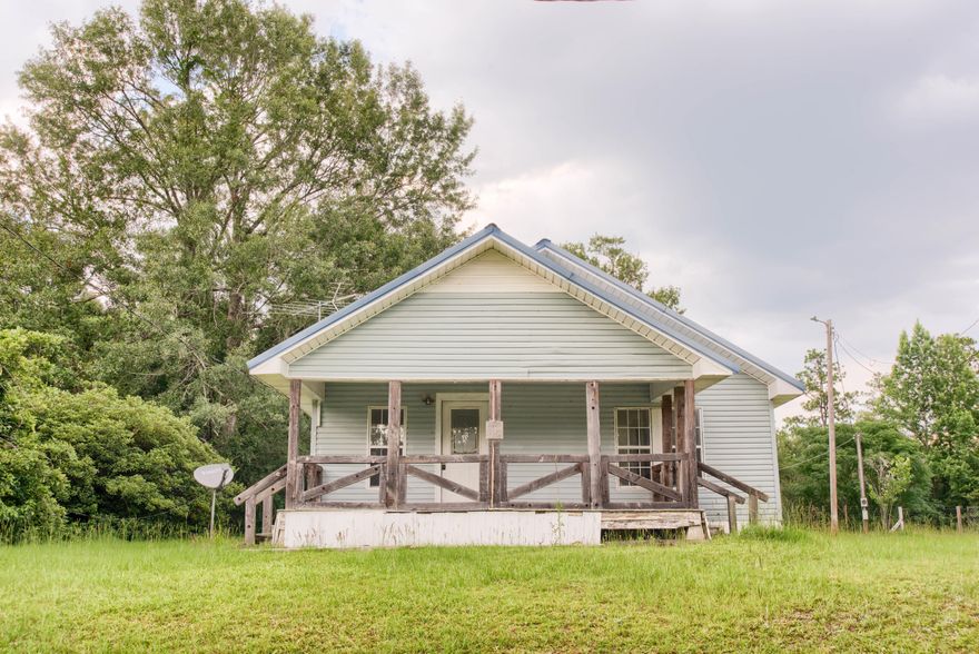 Excellent opportunity to own this 1BR/1BA REO home situated on 1 acre of seclusion. This property is zoned for agriculture and most of the land has been cleared. The home offers a large covered front porch, a light & bright living room, separate dining space or additional living area, laundry/utility room and a spacious, eat-in kitchen. The master bedroom offers beautiful views of the property and features a separate siting area, walk-in closet and private bath w/ dual sinks and garden tub. Out back you'll find a detached shed and rear covered porch that overlooks the backyard with plenty of room to roam. All Information recorded in the MLS is intended to be accurate but cannot be guaranteed, buyer advised to verify. Sold As-Is. Only Cash/Renovation loan offers
