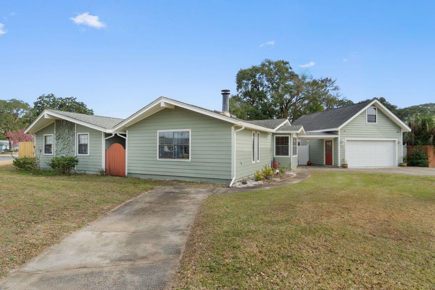 Fantastic opportunity in the heart of Fort Walton Beach awaits. Situated on an oversized corner lot with no HOA, this light-filled three-bedroom, two-bath home offers 2,192 square feet of well-designed living space with strong fundamentals and room to personalize. Offered as-is, the home features copper wiring, a 2018 HVAC system, a freshly painted interior, repaired deck, updated skylight, and full hurricane shutters for added peace of mind. The functional floor plan includes a spacious living area with a wood-burning fireplace, a formal dining room, a full-size laundry room with built-in storage and folding area, and a well-appointed kitchen with solid cabinetry, granite countertops, pantry, stainless steel appliances, double oven, flat stovetop, and vent hood. The generous primary  suite offers private backyard access, a large walk-in closet with built-in vanity, and an ensuite bath with double vanity and oversized soaking tub with tub/shower combo. Two additional bedrooms are filled with natural light and share a guest bathroom featuring a walk-in shower. 

Step outside to a private backyard oasis ideal for entertaining, complete with a covered back porch, large tanning deck, spacious fenced yard, additional storage building, and a well-maintained in-ground pool originally installed in 1996 with a seven-foot depth. Pool improvements include a new liner (2022), sand filter (2022), pool pump replaced in 2020, a spare pool pump, and a recently replaced chlorinator. The expansive two-car garage with additional room for a work area, added in 2011, features additional separate living space above with a shower and toilet, making it ideal for storage, office, or hobby use. This home also features 2 driveways allowing for ample parking for vehicles, boats, or recreational toys

Ideally located just minutes from the sugar-white sand beaches of Okaloosa Island and the waters of Choctawhatchee Bay, with quick access to Eglin Air Force Base and Hurlburt Field. Enjoy nearby shopping, dining, and entertainment in Downtown Fort Walton Beach, along with close proximity to grocery stores, medical facilities, parks, waterfront walking paths, and public boat launches. *New roof and water heater to be provided at closing with an acceptable offer. **Property may be purchased individually or together with the adjacent parcel at 105 SW Cedar Avenue for a combined ??0.64-acre opportunity