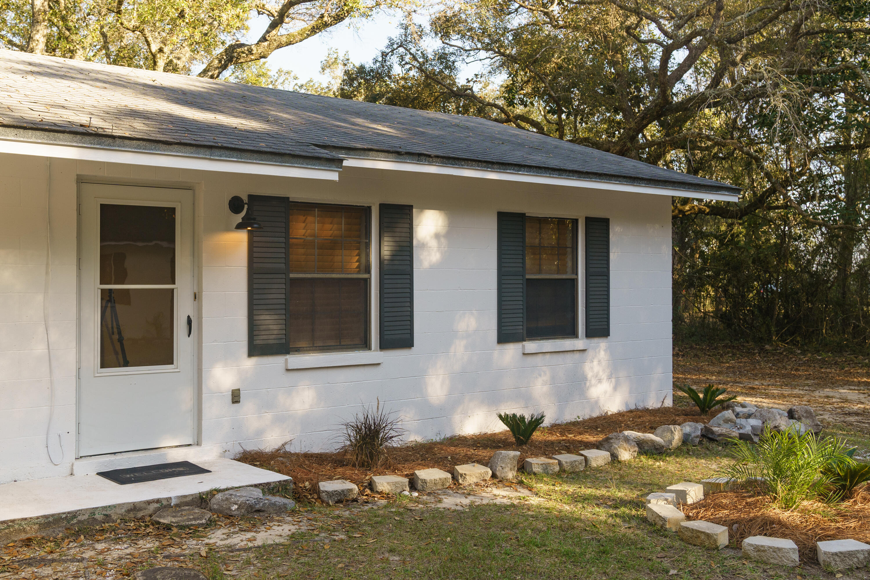 This property has new ownership, and each unit up is getting remodeled. This one has had ceilings and walls painted, new light fixtures inside and ceiling fans installed, new outdoor light fixture, bathroom has new toilet, new sink and vanity with beautiful lighted mirrored medicine cabinets, kitchen has new granite countertop, new stainless steel refrigerator, stove/oven, and hood vent. A new mini washer and dryer will be installed. All of this just minutes from the Mid-Bay Bridge. Pictures are of a similar unit, not unit for rent.