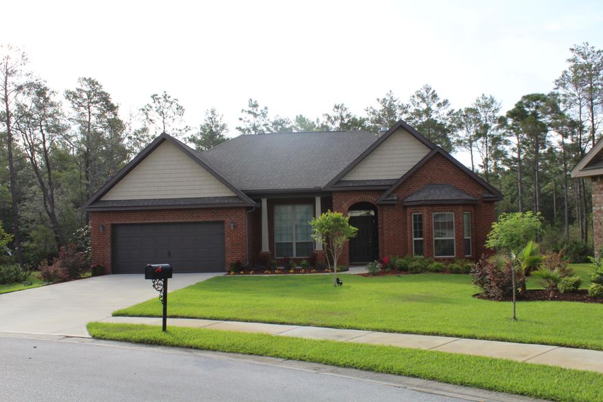 You are going to love living in the fabulous gated community of Windsor Estates! This home offers an open, airy living space with an abundance of natural light. The floor plan features a great room overlooking the kitchen, dining room, and Florida room, making it perfect for entertaining. You will notice right away the rich wood floor that flows throughout much of the home. The Great room has a double tray ceiling and cozy wood burning fireplace. The Kitchen is sure to please the cook in the family with an abundance of cabinetry for storage and spacious granite countertops which offer several working spaces for ease of meal preparation. The Florida room overlooks the mature wooded back yard making it your own private retreat.