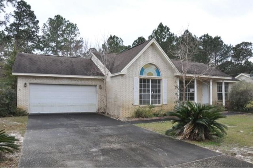 REO property. Located in the Holley by the Sea subdivision, this 1,470 square foot home has the potential to be something wonderful with some TLC! Vaulted ceilings can be found in both the living room and master bedroom. Home is located on a 0.46 acre lot and is fully fenced.