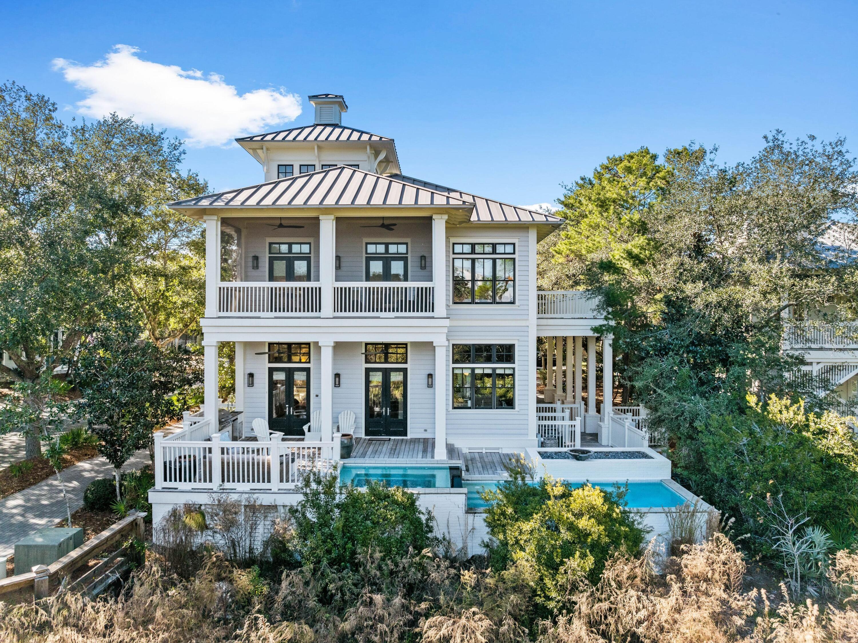 Discover unparalleled luxury and an unbeatable location at 12 Viridian Park, nestled in the heart of the prestigious WaterColor community. This elegant four-bedroom, four-bathroom residence spans 4,400 square feet across three levels, offering an exquisite combination of sophistication and comfort. Positioned just steps from the path leading into Seaside, Florida, this home offers effortless access to the renowned WaterColor Beach Club and Town Center. Outdoor enthusiasts will appreciate the nearby walking and biking trails along Western Lake, creating endless opportunities for recreation and exploration. Step into your private sanctuary with a sparkling pool and expansive outdoor living space, perfect for entertaining or peaceful relaxation. The charming park right outside your front door, complete with overflow parking, enhances the convenience and appeal of this exceptional property. Every detail of this home has been thoughtfully curated to exude character and style. High-end finishes and custom touches throughout create an inviting ambiance. The spacious kitchen, open living areas and well-appointed bedrooms ensure both functionality and beauty. Whether you're lounging poolside, exploring Seaside, or immersing yourself in the vibrant WaterColor lifestyle, this property is a true gem. Don't miss the opportunity to own this extraordinary retreat in one of the most desirable neighborhoods along 30A. 12 Viridian Park is more than a home  it's a lifestyle.