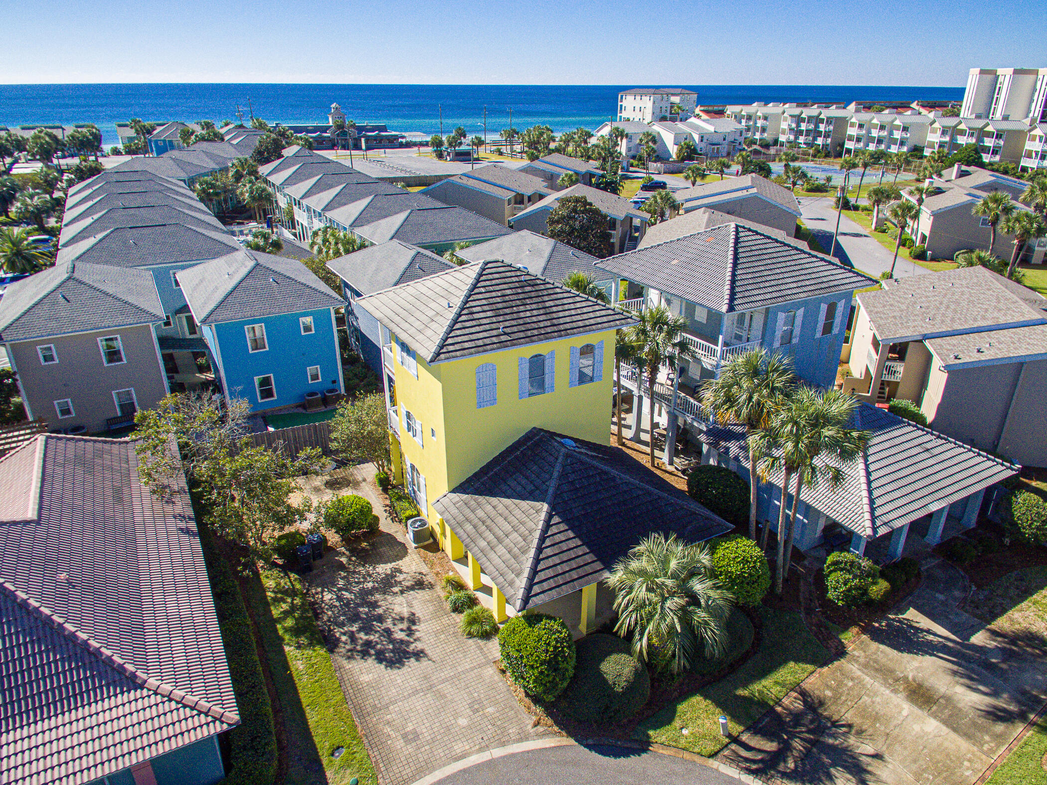 Welcome to 39 Topaz Cove, a fully furnished coastal retreat nestled on a cul-de-sac in the sought-after, golf cart-friendly community of Miramar Beach! Just a 5-minute walk to private deeded beach access with restrooms and a seasonal snack bar, this property offers an unparalleled blend of luxury, convenience, and turnkey living. This smart home features a Nest thermostat and security cameras, ensuring modern comfort and peace of mind. Inside, the open floor plan is perfect for entertaining, with a gourmet kitchen equipped with high-end appliances and custom cabinetry. Three owners' closets provide ample storage for seasonal items or personal belongings, making it easy to maintain a clutter-free space. Outside, enjoy covered balconies on both the second and with gulf views on the third floor, as well as front and back covered porches for year-round relaxation. As part of this vibrant community, residents enjoy access to two inviting pools, a tennis court, and a basketball court, adding to the appeal of this exceptional home. With all furnishings included, 39 Topaz Cove is an exceptional, move-in-ready opportunity in Miramar Beach. Whether you're seeking a full-time residence, vacation home, or rental investment, this beautifully appointed property provides the ideal beach lifestyle in a quiet, friendly setting. Don't miss your chance to call this slice of paradise your own!

