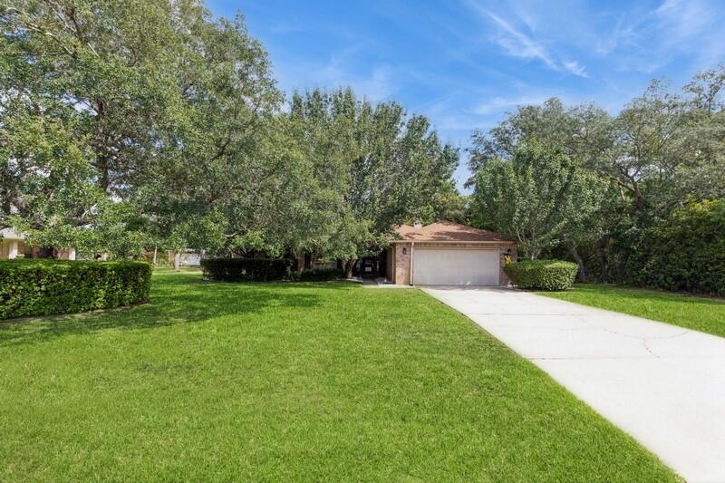 Welcome to this stunning property in Hidden Creek Estates, a golf course community. This exquisite 4-bedroom, 2-bathroom all-brick home is a true gem featuring a heated and cooled Florida room, perfect for year-round enjoyment. The property boasts a beautiful pool with a screen enclosure, and an impressive 26 x 26 outdoor kitchen equipped with Tennessee flagstone, a Leisure Bay hot tub that fits 10 people, and granite countertops throughout. The outdoor fireplace is propane with an area above for a television with cable, adding even more convenience. The outdoor attached gazebo is an entertainer's dream, complete with ceiling fans, downlighting and a Big Green Egg and propane connection for all your grilling needs. There is also a space for a fridge, making it perfect for cold drinks and gatherings. The front porch also showcases Tennessee flagstone, adding to the home's curb appeal. The front door is a storm door with privacy glass, and all locks are smart lock features. The exterior fence is a bit higher than the HOA requirement and was grandfathered in. Conveniently located on a golf course, residents can easily access the course right from their backyard.
The interior of this home is very inviting. Every room was freshly painted. The master bedroom features ocean blue walls, crown molding, and LVP floors installed in 2022. The 2 walk-in closets in the master bathroom include upgraded adjustable closet racks. The owner's suite bathroom is a luxurious retreat with a whirlpool tub, tile backsplash with shiplap, and a fully tiled standing shower. The indoor fireplace is a wood-burning fireplace, creating a cozy atmosphere. The chef's kitchen is equipped with a KitchenAid double oven, a flat surface cooktop, Whirlpool stainless steel appliances, and a fridge with an icemaker. The kitchen also features a riverstone backsplash, adding a touch of elegance. Throughout the house, you'll find LVP flooring installed 2022 in the living room and bedrooms, tile in wet areas, and hardwood in the dining room. The GE washer and dryer are included with the purchase of the home. Additional features include an AC unit installed in 2019 with a germicidal feature, a new water heater installed in 2021, and a Rainbird sprinkler system. The smoke detectors in the house are not just smoke detectors but also carbon monoxide detectors, ensuring extra safety for you and your family. This spacious home is well-maintained and kept very clean by the current owners. Conveniently located on a golf course, residents can easily access the course right from their backyard. Don't miss the opportunity to make this exceptional property your new home!