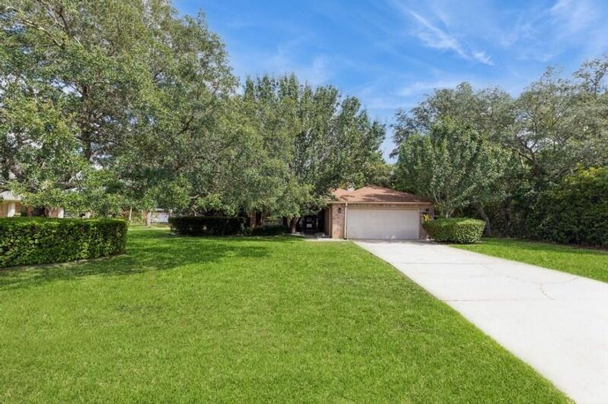 Welcome to this stunning property in Hidden Creek Estates, a golf course community. This exquisite 4-bedroom, 2-bathroom all-brick home is a true gem featuring a heated and cooled Florida room, perfect for year-round enjoyment. The property boasts a beautiful pool with a screen enclosure, and an impressive 26 x 26 outdoor kitchen equipped with Tennessee flagstone, a Leisure Bay hot tub that fits 10 people, and granite countertops throughout. The outdoor fireplace is propane with an area above for a television with cable, adding even more convenience. The outdoor attached gazebo is an entertainer's dream, complete with ceiling fans, downlighting and a Big Green Egg and propane connection for all your grilling needs. There is also a space for a fridge, making it perfect for cold drinks and gatherings. The front porch also showcases Tennessee flagstone, adding to the home's curb appeal. The front door is a storm door with privacy glass, and all locks are smart lock features. The exterior fence is a bit higher than the HOA requirement and was grandfathered in. Conveniently located on a golf course, residents can easily access the course right from their backyard.


The interior of this home is very inviting. Every room was freshly painted. The master bedroom features ocean blue walls, crown molding, and LVP floors installed in 2022. The 2 walk-in closets in the master bathroom include upgraded adjustable closet racks. The owner's suite bathroom is a luxurious retreat with a whirlpool tub, tile backsplash with shiplap, and a fully tiled standing shower. The indoor fireplace is a wood-burning fireplace, creating a cozy atmosphere. The chef's kitchen is equipped with a KitchenAid double oven, a flat surface cooktop, Whirlpool stainless steel appliances, and a fridge with an icemaker. The kitchen also features a riverstone backsplash, adding a touch of elegance. Throughout the house, you'll find LVP flooring installed 2022 in the living room and bedrooms, tile in wet areas, and hardwood in the dining room. The GE washer and dryer are included with the purchase of the home. Additional features include an AC unit installed in 2019 with a germicidal feature, a new water heater installed in 2021, and a Rainbird sprinkler system. The smoke detectors in the house are not just smoke detectors but also carbon monoxide detectors, ensuring extra safety for you and your family. This spacious home is well-maintained and kept very clean by the current owners. Conveniently located on a golf course, residents can easily access the course right from their backyard. Don't miss the opportunity to make this exceptional property your new home! 