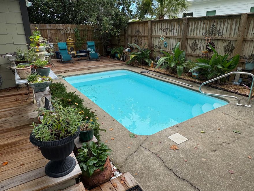 Ideal location in the First Addition of Gulfview Heights. Cool little Florida cottage nestled in the woods close to the Beach. Restaurants and shopping are close by.  You must see this location in person! Trails everywhere, beach a few blocks away. The square footage taken from the county record, however, the Master wing was added, making the house more like 2,000 sq ft. The backyard has a 10 ft privacy fence.  Oasis in the backyard with a nice pool.