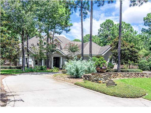 Anytime you can begin the description of a property that has five bedrooms, a home theater and a suite-sized office by saying, ''First, take a look at the grounds,'' then you know you're talking something special. On a street renowned for its over-sized lots, 3102 Merion in the secluded Burnt Pine section of Sandestin Golf and Beach Resort stands out for both its sheer size and meticulous care. Canopy lights in giant pines throw light on manicured beds, endless swathes of manicured grass and formal gardens. It has statuary, fruit trees and ornamental iron fencing. One side faces #6 green and fairway at Burnt Pine Golf Club, the other looks down the T-box and fairway of #7. It is a property worthy of the custom designed home that graces it. The details are below. They include all