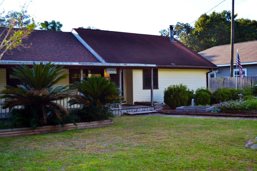 Charming, well loved home on a half acre lot in Seminole. 2 large bedrooms and 2 baths in main house. Originally was 3 bedrooms and seller combined two rooms into one - could be converted back to 3 bedrooms. Large family room with wood burning stove plus a second living area. New appliances in kitchen and wood floors throughout. Great, large, detached workshop with office and 1/2 bath. The large lot has wonderful fig trees, lots of space to garden and a great back deck for dining outdoors. Many a game of horseshoes and croquet have been played over the years in the spacious yard. Home is being sold as is. Buyer to verify information that is important to the, including but not limited to, square footage.