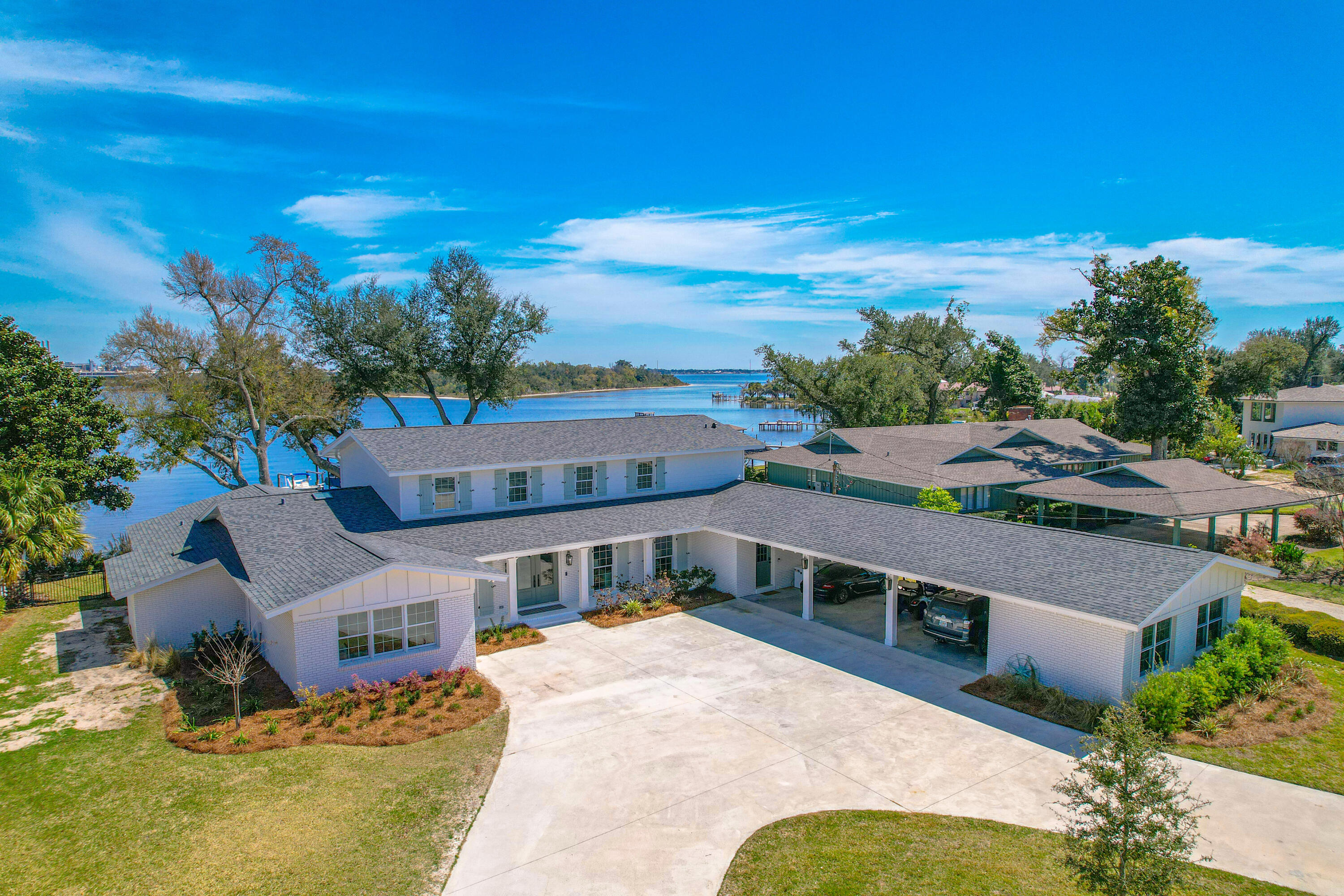 Entered for comp purposes only. This is a beautiful, fully-renovated waterfront home in the historic Cove neighborhood. Offering over 5,200 square feet, 5 bedrooms, 4 full baths and 2 half baths, this two story home features a main level primary suite and multiple living areas with pure bay views. This home also features a pool and dock.