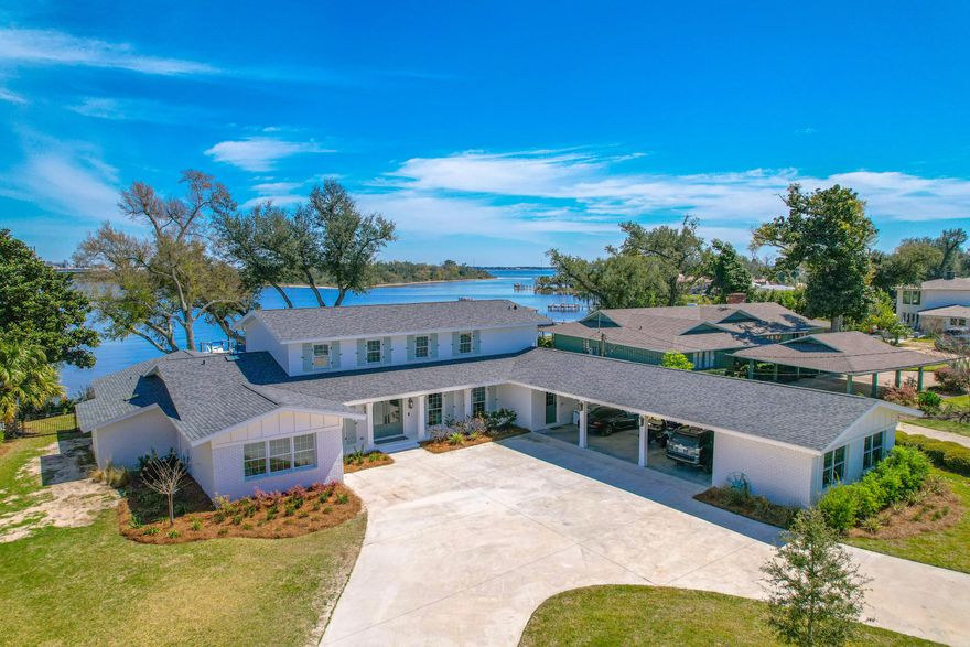 Entered for comp purposes only. This is a beautiful, fully-renovated waterfront home in the historic Cove neighborhood. Offering over 5,200 square feet, 5 bedrooms, 4 full baths and 2 half baths, this two story home features a main level primary suite and multiple living areas with pure bay views. This home also features a pool and dock.