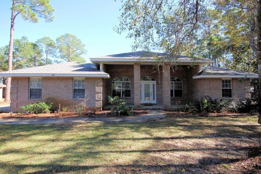 All brick 4 bedroom 2 bath home located on -1/2 acre lot in the desirable neighborhood of Driftwood Estates. This spacious home has an open floor plan with an abundance of windows allowing for lots of sunlight, a large living room with electric fireplace, formal dining room, and kitchen with breakfast area. The large master suite features French doors that open to the covered back patio, a master bath with a jetted garden tub, separate shower, double vanity, and his and her walk-in closets. Other upgraded appointments include Corian kitchen counter tops, textured walls, and a two car side entry garage. A portion of the large back yard is fenced and the remainder leads out to a small lake. Driftwood Estates is a great community offering a large park area featuring a baseball back stop,...