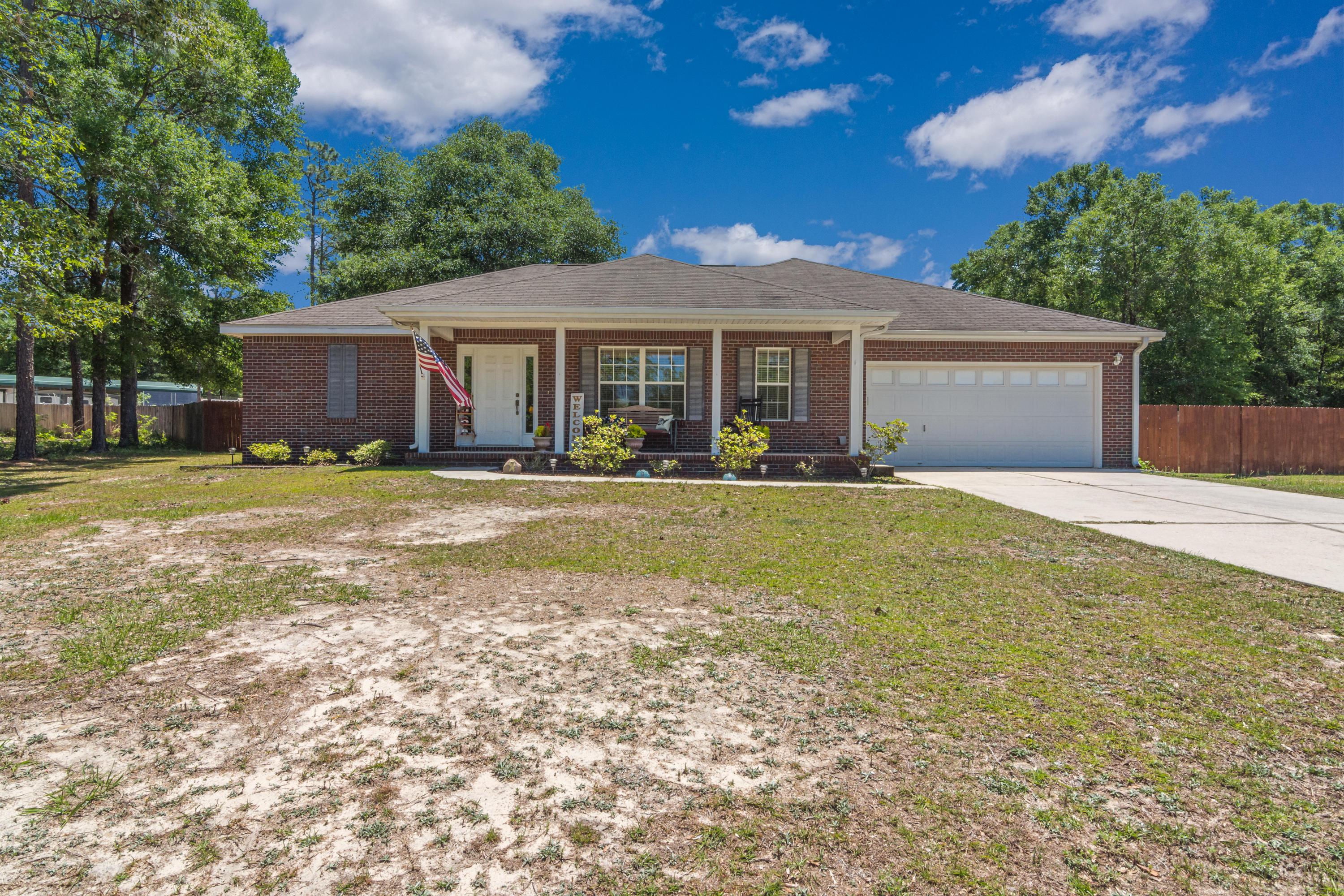One acre with RV parking and electric! Come home to this adorable Baker home. Located in a quiet circle in Baker school district, and only minutes from bases and shopping! Carpet free in all living areas, with an open kitchen, newer appliances and the split floorplan for convenience. TWO huge sheds run with power, and a double car garage make room for all the toys and work space. Outdoor seating? Basketball hoop? There is space with an extra 26x30 foot concrete pad out back to use in any way you can think up. Neutral colors, ample spaces, and a dreamy master bedroom round out the home...welcome home.