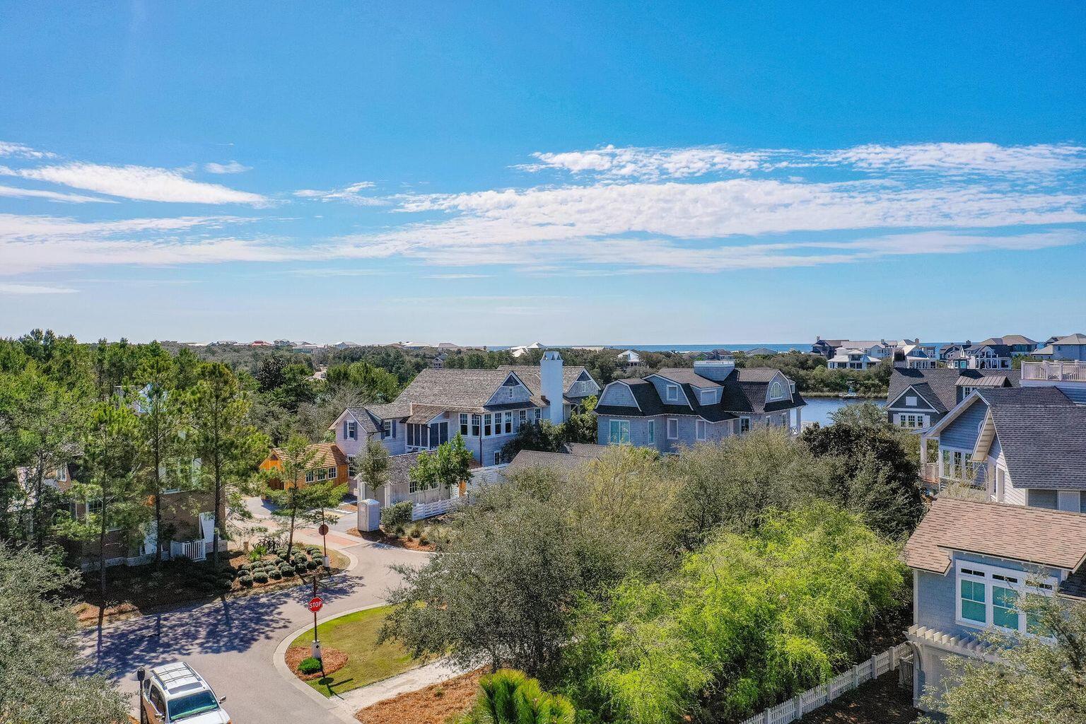 Exceptionally GOOD BUY! Awaiting your future Beach home. Just 4 tiers from the Gulf in the exclusive gated community of Peninsula in Watersound Beaches. Your home will convey Gulf views and a short stroll to 1.5 miles of private beaches.The last corner lot in Watersound Beaches.This elevated site also comes with Architectural & Engineering plans, You'll have access to expansive boardwalks, pedestrian bridges,natural walking trails, parks, pool,fitness Center Kayak & Paddle board storage & Community . rooms. Peninsula is the premier Community in Watersound. Beaches.
