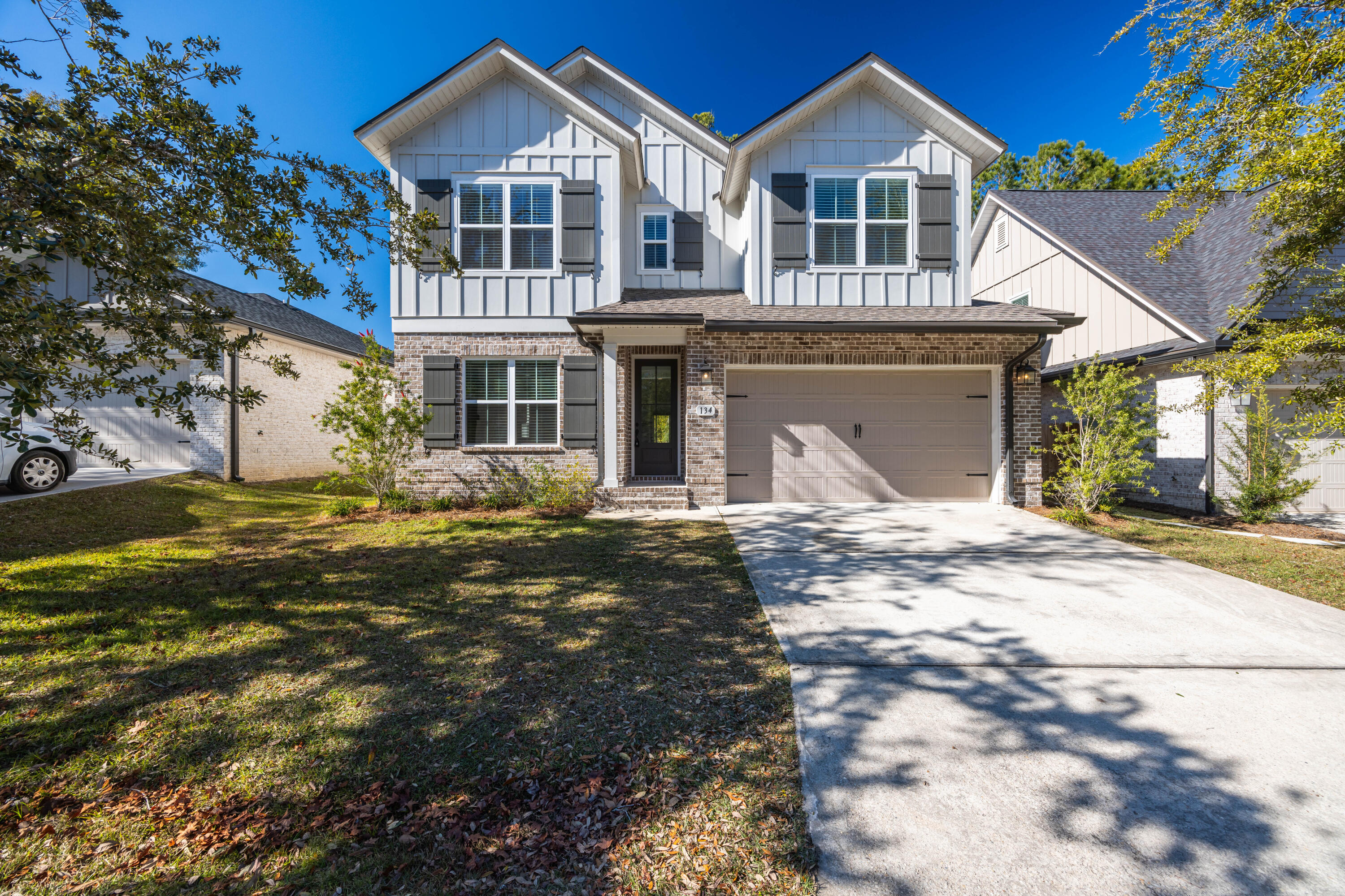 Welcome to this magnificent 4-bedroom, 2.5-bathroom home, offering 2,376 sq. ft. of thoughtfully designed living space in a peaceful, family-friendly neighborhood. This like-new home features a host of upgrades and modern finishes, perfect for comfortable living and entertaining.The open floor plan boasts 9 ft ceilings and an abundance of natural light, creating an inviting atmosphere throughout. The first-floor primary suite includes a spacious bedroom, a luxurious ensuite bathroom with a dual vanity, a large 3x5 tiled shower with dual showerheads, and a walk-in closet.The kitchen is a chef's dream, complete with upgraded granite countertops, a stylish subway tile backsplash, a large eat-in bar and opens seamlessly into the great room, making it perfect for hosting family and friends. A flex room at the front of the home offers versatility as a den, office, or formal dining room.

Upstairs, you'll find three additional bedrooms, a full bathroom, and a open bonus room overlooking the grand living area downstairs, perfect for a home office, media room, play area or additional living space.

The home's exterior is equally impressive with a brick fa??ade, low-e vinyl windows, a covered entry, a rear covered lanai, a 2-car garage, and a landscaping package complete with an automatic sprinkler system.

Additional features include:
*Laminate, tile, and carpet flooring
*Crown molding and cased windows on the main floor
*Brushed nickel fixtures
*Granite countertops in the kitchen and bathrooms

Conveniently located for quick access to Hwy 20 and Freeport shopping, this home offers an easy drive to the breathtaking sandy white beaches of Florida's Emerald Gulf Coast and the vibrant coastal lifestyle of 30A. With Freeport's thriving  & growing community and proximity to outdoor activities, this home offers the perfect blend of modern living with a touch of tranquility.

Don't miss the chance to make this stunning property your dream homeschedule a showing today!

**All measurements are approximate and listing info to be verified by the buyer. 