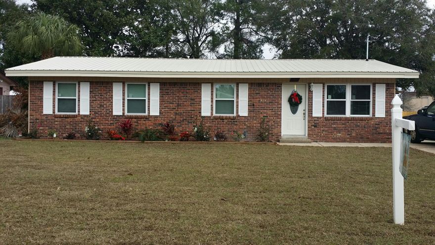 **Brick Home in Central Fort Walton Beach**New Energy Efficient Metal Roof**Energy Efficient New Windows & Doors**Rewire to ALL COPPER & Updated Service Panel & Breaker Box**New Kitchen**Tall Ceilings**2 Living Areas (One could be utilized as a Large Master Bedroom)**Large Open Kitchen**New Lighting**New Tile & Carpet**Large Bedrooms**New Custom Master Bath with Custom Tile Bench & Multiple Shower Heads**Fresh Paint & Flooring Throughout**Granite Countertops**New A/C Unit Inside & Out**New Water Heater**New Lawn Pump**Fully Fenced Backyard**New Sod & Landscaping**Corner Lot in an Established Neighborhood**Close to Eglin & Hurlburt Field**Shopping is around the corner**Fantastic Schools are blocks away**