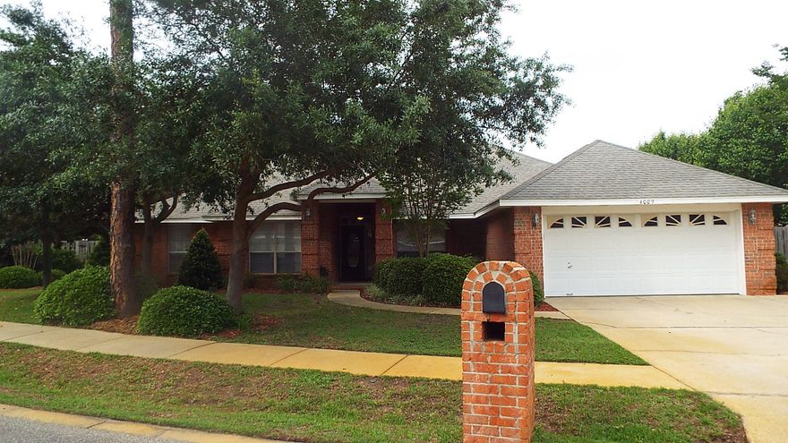 You will fall in love with this completely updated home. Wood and tile throughout home, crown molding, window and door cases, new beautiful cabinets, granite counter tops, sink and stainless appliances all make this home look and feel brand new. Large master suite on one end of the home and other 3 bedroom down a wide hall. The master bath has 2 walk in closets with built in shelving, tub, separate shower,2 sinks and separate toilet room. Additional living area can be office, playroom or teenager area. The back patio has just been enlarged and bricked, so inviting. Separate shed for all the outside toys and tools. Large side yard if pool was ever desired. Large laundry room with sink connection. Termite Bond, 2 car garage, completely brick home and excellent maintained inside and out.