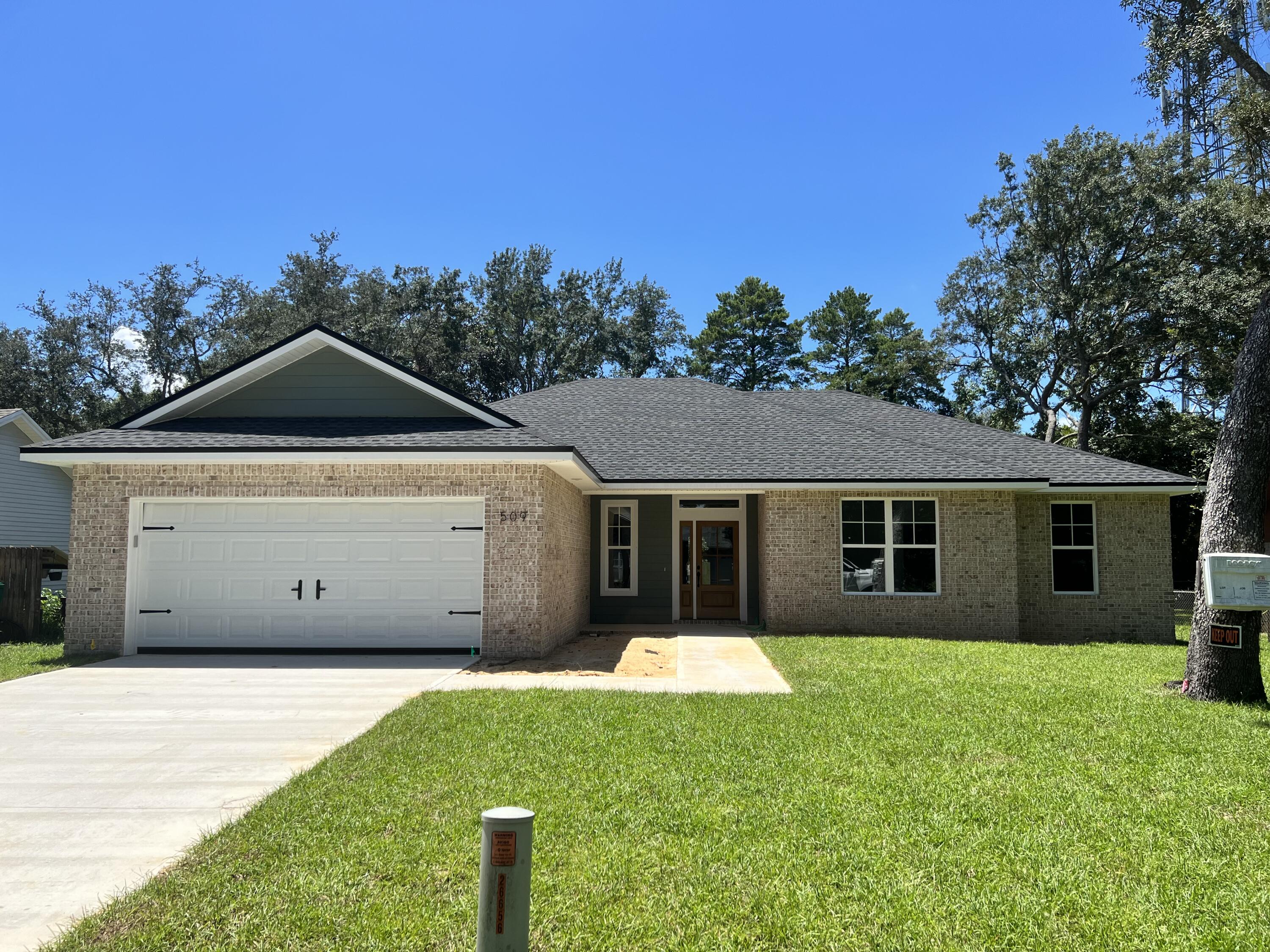 NEW 4 bedroom home. EXTERIOR FEATURES: All brick, hardie accents, privacy-fenced yard, 2 car garage w/ auto opener, irrigation system, well pump & landscaping. INTERIOR FEATURES: Open & split floorplan, granite kitchen tops, kitchen backsplash, stainless steel kitchen appliances, large walk-in pantry, marble bathroom vanity tops/tubs/shower, tile in baths, & utility, carpet in 3 bedrooms, 'life proof' laminate wood flooring all other areas including master bedroom, large crown molding and window casing in main areas, large baseboards, plenty of storage. OTHER FEATURES: A 1-yr builder warranty is provided, title & closing to be held with Tammy Jones at First National Land & Title