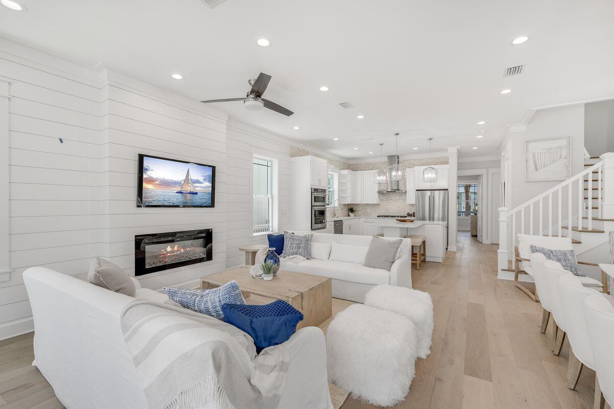 Brand new construction awaits in the coveted coastal community of Seacrest, ideally positioned between Alys and Rosemary Beaches along Scenic Highway 30A. Boasting nearly 3,000 square feet of living space, five bedrooms and five-and-a-half baths spread over three stories, this fully-furnished home is ideal for large groups or rental investment. Recently completed in 2022, this home offers high-end finishes, owner's suites on the first and third floors, two living areas and abundant natural light in an open-concept design. The second floor provides two bedrooms and a bunk room with access to a second-story porch ideal for relaxing after a day in the sun. This home offers convenient access to a large lagoon pool and beach access as well as tram service to the beach and close walk to