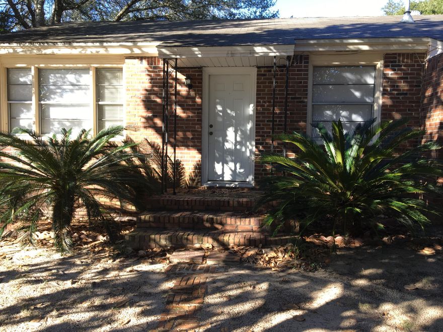 Charming Brick Home in Ocean City with a large yard! Detached garage has been converted to a workshop with built in cabinets and counter tops. It is located near schools, shopping, both bases, and the bay. Needs a little a TLC. HVAC is 3 years old. Bathroom has been updated.