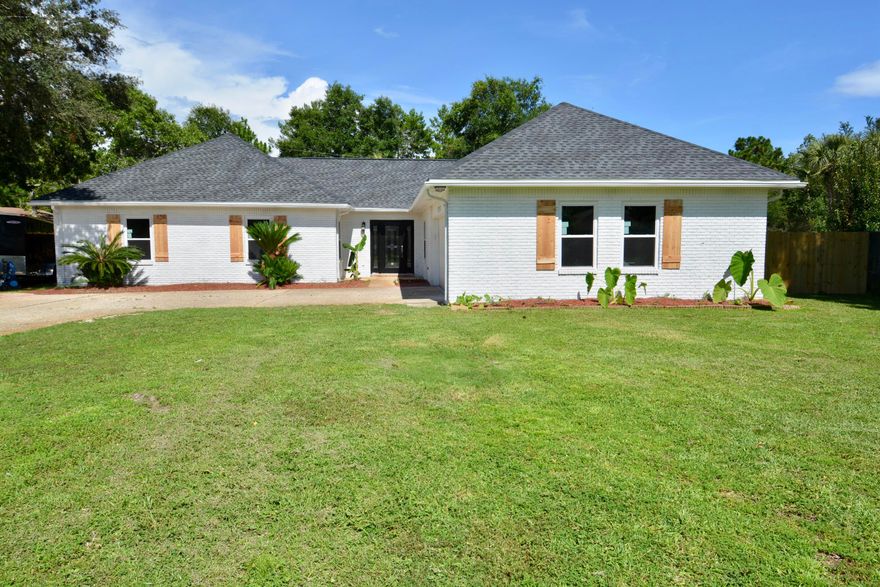 This exquisite 4 bed/2.5 bath home w/ pool & office nestled in the quiet neighborhood of Raintree Estates has recently undergone a major renovation, pairing brand new finishes with the charm of an established home. Featuring vaulted ceilings; a new ROOF; new AC; new WINDOWS new 'all wood' kitchen w/ soft close drawers and doors, quartz counters, an oversized island & stainless steel appliances; engineered wood flooring throughout; enormous master bed & bath with freestanding tub & custom tiling; open fireplace; and separate office. This home is perfect for entertaining with a large open floor plan spilling out to the covered patio and out onto the pool deck, the pool has been newly retiled and plastered. Close to Maxwell Gunter Rec area, Destin, Niceville and Eglin AFB