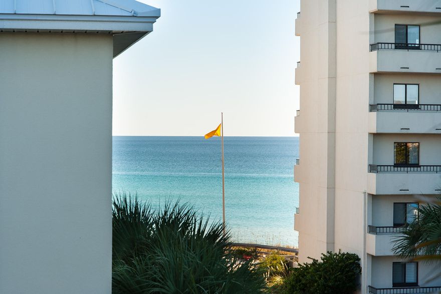 Less than 500 feet from paper white sands and aquamarine waters of the Gulf of Mexico, this desirable, 3-story beach home brings together the best in vacationing, location and investment. It is strategically located on the beach side of Scenic 30A and thoughtfully designed for function and timeless appeal. With an annual revenue stream that tops $120,000, this beach house is a home for all seasons and all reasons. The top floor has exquisite hardwood floors and charming, open living spaces with natural daylight streaming through copious windows. Relax on soft furniture or at the game table, dining table or classy wood and wrought iron bar stools that cozy up to the counter.