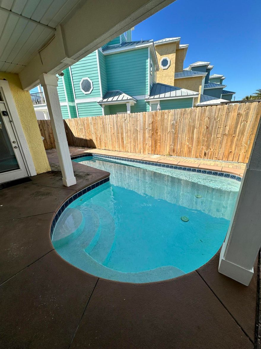 Gulf Views - 5 Bedroom / 5 Bath Beachside Investment Opportunity -Perfectly positioned just across the street from the sugar-white sands and emerald waters of Panama City Beach, this spacious 5-bedrooms, 5-bath home offers the ideal blend of luxury, location, and income potential. Situated between Beach Access 93 and 94, you're only steps away from the beach while enjoying the privacy of your own coastal retreat. This home is designed for both relaxation and entertaining, featuring a private backyard pool--perfect for cooling off after a day in the sun. With five full bedrooms and bathrooms, there is plenty of space for large groups, making it an excellent vacation rental opportunity. Located in one of the most convenient areas on the beach, you're just minutes from popular restaurants, shopping, and entertainment, while still enjoying a quieter stretch of the coastline. It's also a short drive to the airport and the scenic communities and dining of 30A. With no HOA restrictions, this property offers flexibility for owners and investors alike. Whether you're looking for a primary residence, second home, or high-performing rental, this beachside property checks every box.