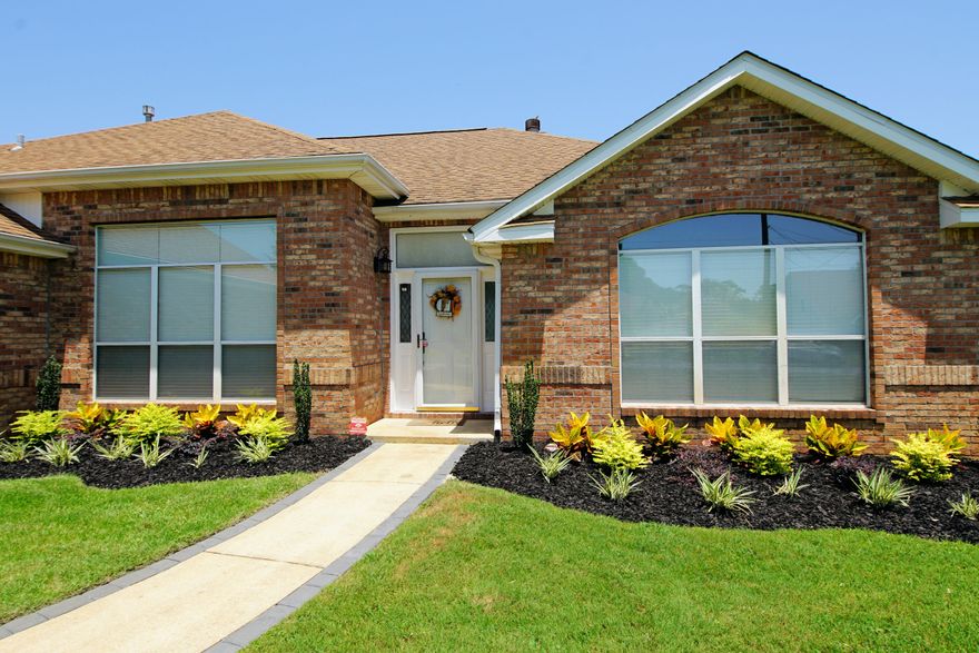 Gorgeous, updated, and move-in ready home with 4 bedrooms, 2 bathrooms and 2169 sq ft located close to the bases and the beaches! Enter this immaculate home and notice the open and split floor plans! The dining room opens to the living room and kitchen! The kitchen has custom, solid wood maple cabinets, newly tiled backsplash and Silestone countertops! There is a kitchen island and a breakfast bar! The appliances are stainless and black and feature a built-in microwave and a French Door Refrigerator. In addition the kitchen features pendant and recessed lighting and an eat-in area that overlooks the large backyard! The living room has been updated to include built-in book cases and a beautifully, tiled backslash around fireplace and mantel. This home is a smart home with lights, TV, and the Thermostat electronically controlled! Other updates include crown molding lining the living room and dining room, solid core doors, sliding glass doors, new interior paint, security system, new 12x12 tiled flooring, and some new light fixtures! This home features a screened under roof patio off the master bedroom! The master bedroom features double trayed ceilings, new ceiling fan, and sliding glass doors to the screened patio. The master bathroom features a walk-in shower, soaking tub, walk-in closet, and a double vanity! There are an additional 3 bedrooms and a full bath on the opposite side of the home! The backyard is large and is wrapped with a privacy fence with gates. In addition the yard features a sprinkler system! In addition to the new landscaping, the seller has added paver boarders to the walk-way leading to the front door and also extended the driveway with brick pavers! The roof was installed in year 2005. Extra plywood decking has been added to the attic for additional storage space. There is a pull-down stairs to attic. The laundry room features a sink and extra cabinetry for maximum storage space! Buyer to verify all information and dimensions!