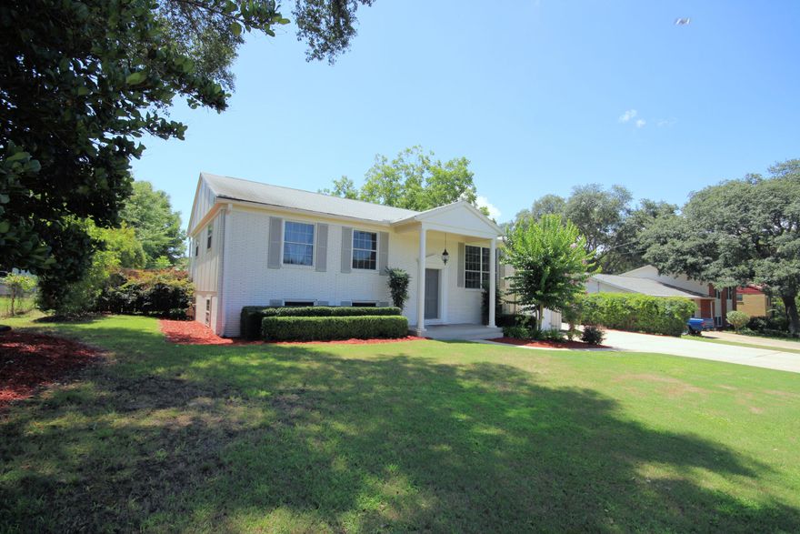 Southern Charm and character in the heart of Ft Walton Beach! You will fall in love the moment you pull up. This home features 2 living areas, 2 kitchens, 4 bedrooms (2 masters), office, screened porch and incredible landscaped yard with POOL and original, REAL, hardwood floors! Step inside and you will notice crown molding, all updated lighting and the light and bright living and dining area which is open to the kitchen featuring stainless steel appliances, glass tile back splash, breakfast bar and gas stove for the true cook. In the finished basement is another kitchen, bedroom, large living area and office. Out back you will appreciate the low maintenance salt system pool, screened porch and lovely landscaped yard. FREE one year home warranty. Make your appointment - read more...