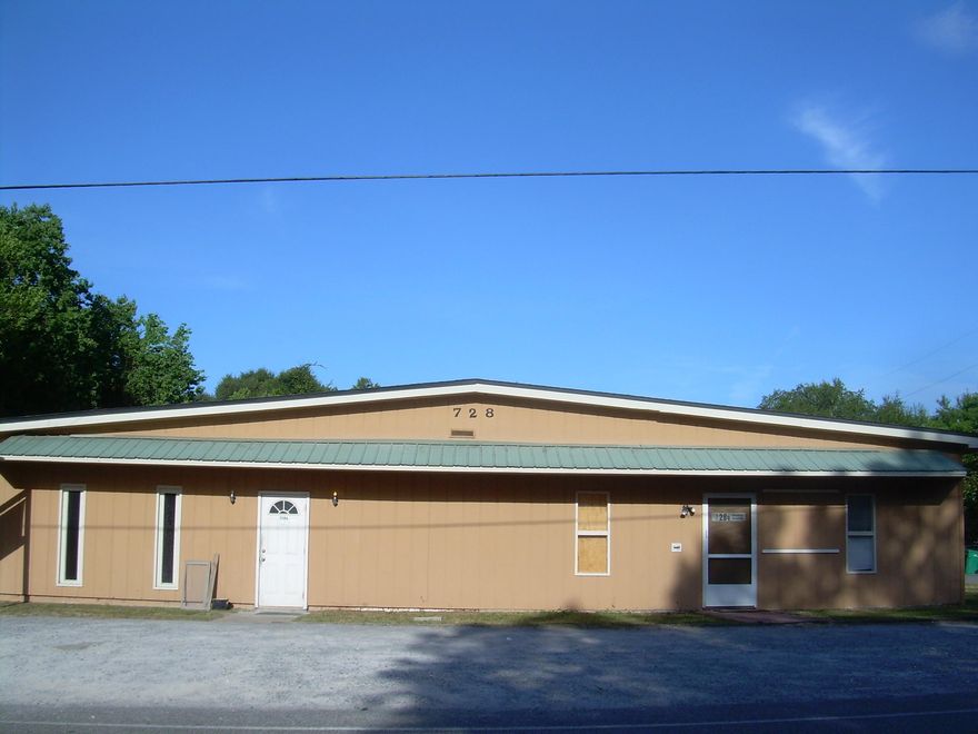 This property can be used for many things. A - is very nice 3/4 bath, Kitchenette, entertainment room, storage room with a garage door, three other adjoining rooms. B is a raw shell for storage. A is $1000 a month and B is $400 a month both on month to month. A wants to stay. Purchase for your use or for rental income. Large back yard, parking in front and in back. Big bay door for 18 wheeler drops