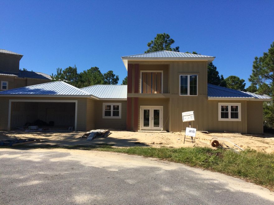 The best of both worlds! Enjoy a quiet family oriented neighborhood while living about 1/2 mile from the beach. This new construction home features an open bright floor plan, with tile through out, except in the bedrooms. LED technology lighting, stainless steel appliances, granite countertops and so much more. The neighborhood offers a breathtaking 3 level 15,000sqft pool and is about 1/2 mile from Ed Walline beach. Built on one of the last lots available in Phase I this one won't last long. Please call before showing for additional instructions.